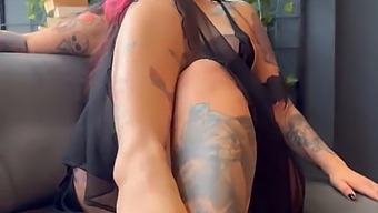 Aroused Young Woman With Tattoos Displays Her Physique